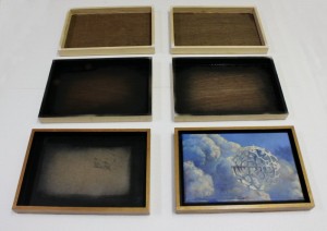 Picture frames built from recycled materials.